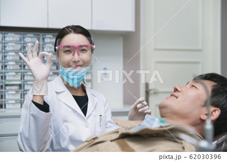 Healthcare, medicine and people concept. Female or Male doctor working in hospital 305 Healthcare, medicine and people concept. Female or Male doctor working in hospital 305 62030396