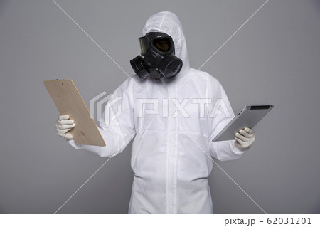 Male scientist in protective suit and antigas mask with glasses. 029 Male scientist in protective suit and antigas mask with glasses. 029 62031201