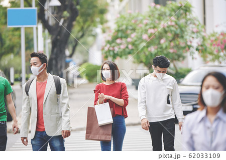 Citizens of polluted city 62033109