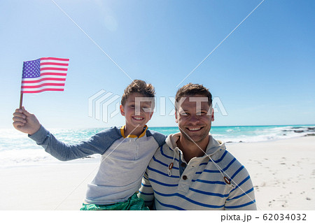 Father and son at the beach Father and son at the beach 62034032