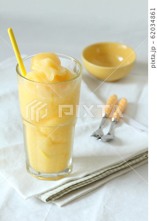 mango and passion fruit smoothies drinks on white 62034861