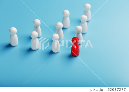 The leader in red leads a group of white employees The leader in red leads a group of white employees 62037277