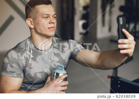 A handsome man is engaged in a gym 62038039