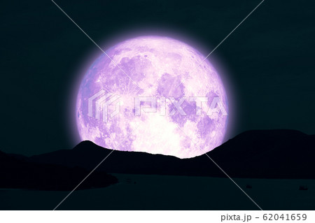 Full Snow Moon on night sky back silhouette island Full Snow Moon on night sky back silhouette island 62041659