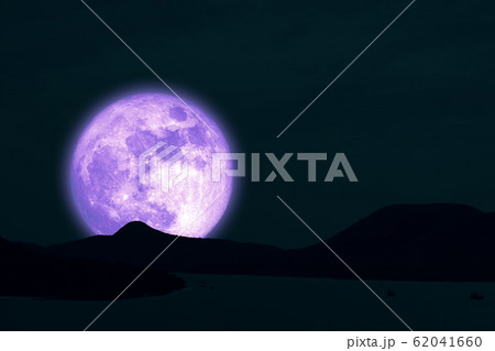 Full Snow Moon on night sky back silhouette island Full Snow Moon on night sky back silhouette island 62041660
