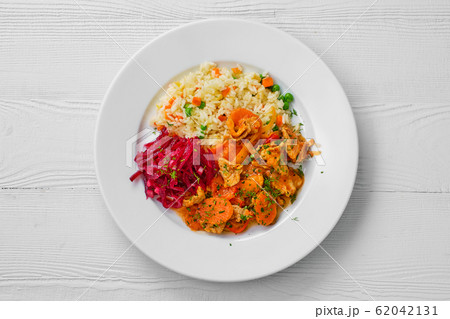 Top view of plate with beef goulash and rice 62042131