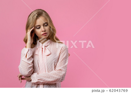 Portrait of beautiful tender curly blonde woman 62043769