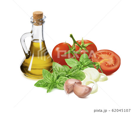 Italian pesto ingredients, tomato, green basil, onion, garlic and oil in bottle isolated on white 62045107