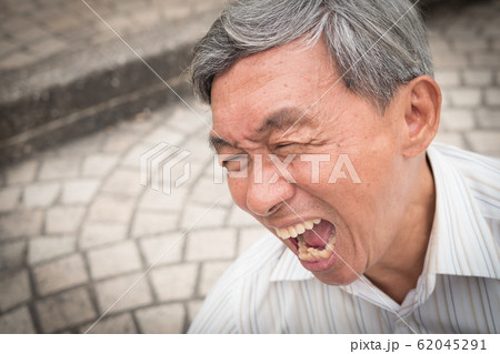 old man senior screaming shouting with pain old man senior screaming shouting with pain 62045291