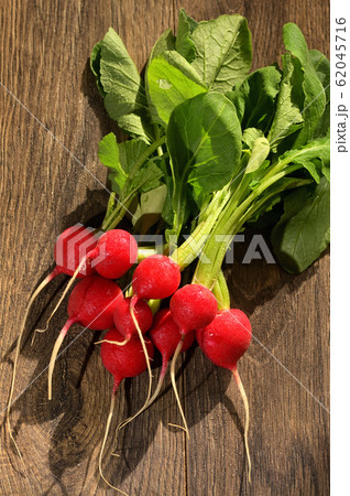 Bunch Of Fresh Radish On Wooden Bunch Of Fresh Radish On Wooden 62045716