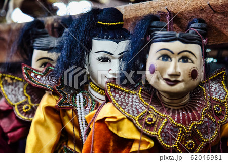 Traditional handicraft puppets are sold in a Traditional handicraft puppets are sold in a 62046981