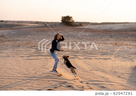 a young Caucasian girl somewhere in a leather 62047291