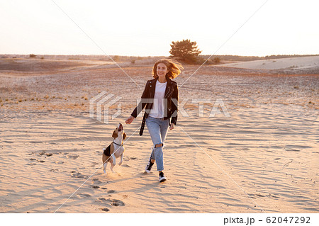 a young Caucasian girl somewhere in a leather 62047292