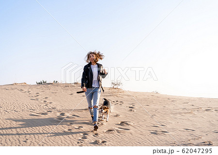 a young Caucasian girl somewhere in a leather 62047295