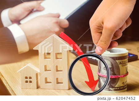 The concept of falling real estate market. Reduced interest in the mortgage. A decline in property prices and apartments. Low interest rates on mortgage loans. Reduced demand for home. selective focus 62047452