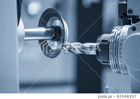 The operation of cutting tool making machine. 62048307