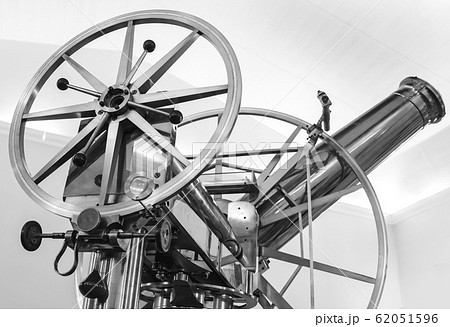 Old vintage shining brass telescope closeup photo 62051596