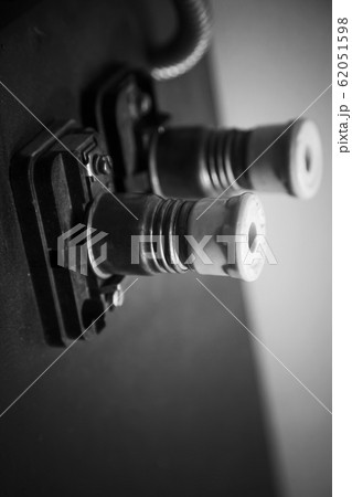 Two vintage electrical fuses on dark panel Two vintage electrical fuses on dark panel 62051598