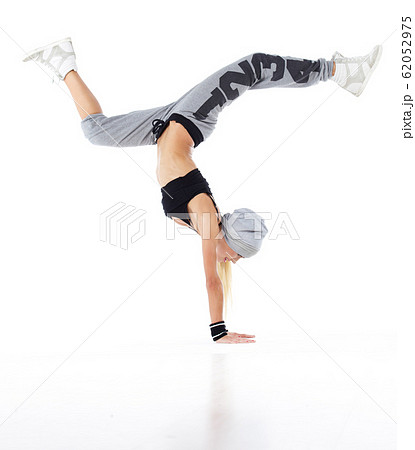 young and beautiful dancer posing in studio 62052975
