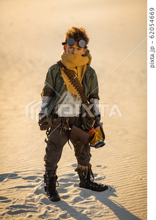 Post-apocalyptic Warrior Boy Outdoors in a Wasteland Post-apocalyptic Warrior Boy Outdoors in a Wasteland 62054669