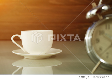 coffee cup and alarm clock coffee cup and alarm clock 62055877