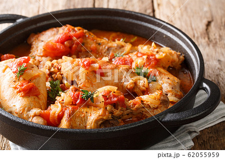 Cunillo stew of rabbit in tomato sauce with white 62055959