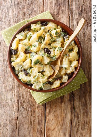 African potato salad with yogurt, herbs, spices African potato salad with yogurt, herbs, spices 62056043