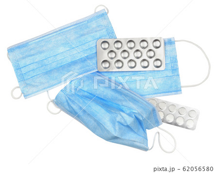 Blue medical mask and pills 62056580