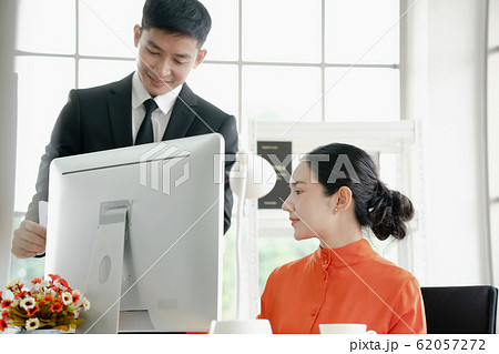 Diverse employees talk cooperating at office table Diverse employees talk cooperating at office table 62057272