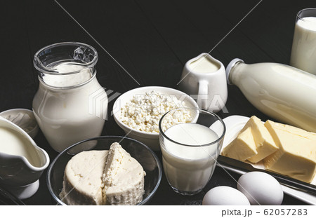 Dairy products on black wooden background with copy space Dairy products on black wooden background with copy space 62057283