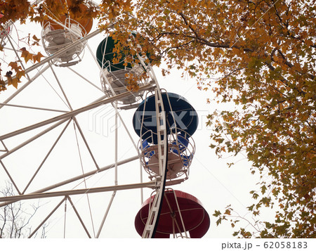 Part of the ferris wheel on the background of a Part of the ferris wheel on the background of a 62058183