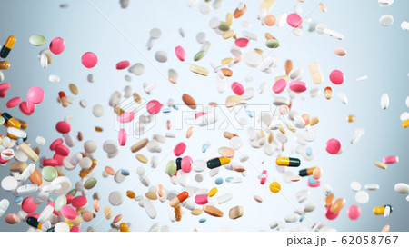 Freeze motion of flying pills on white background Freeze motion of flying pills on white background 62058767