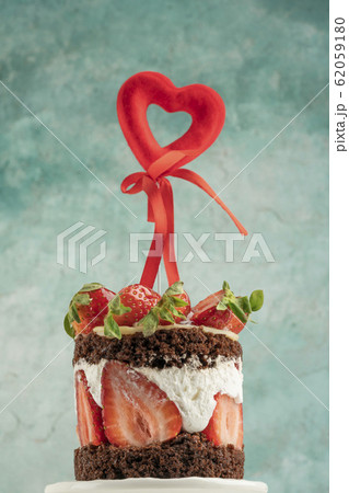 chocolate and strawberry cake decorated with heart 62059180