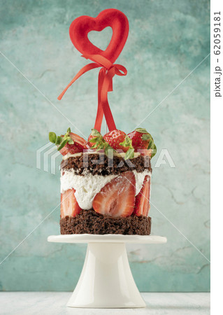 chocolate and strawberry cake decorated with heart 62059181