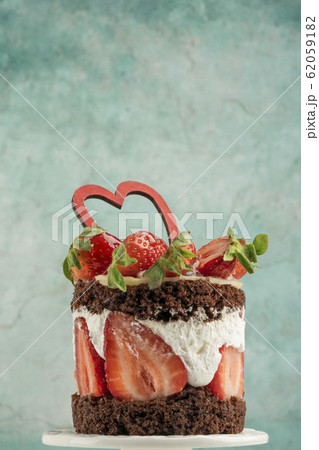 chocolate and strawberry cake decorated with heart 62059182