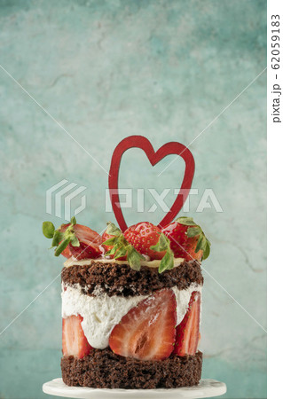 chocolate and strawberry cake decorated with heart 62059183