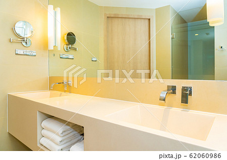White sink with water faucet decoration in bathroom White sink with water faucet decoration in bathroom 62060986