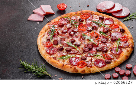 Pepperoni Pizza with Mozzarella cheese Pepperoni Pizza with Mozzarella cheese 62066227