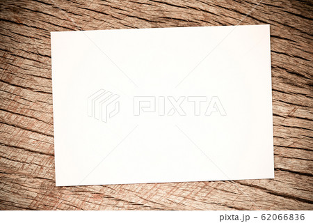white paper on rustic wood background / Mock up 62066836