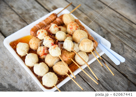 Meat ball , fish ball and sausage hotdog grilled Meat ball , fish ball and sausage hotdog grilled 62067441