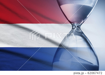 Hourglass over the flag of the Netherlands Hourglass over the flag of the Netherlands 62067472