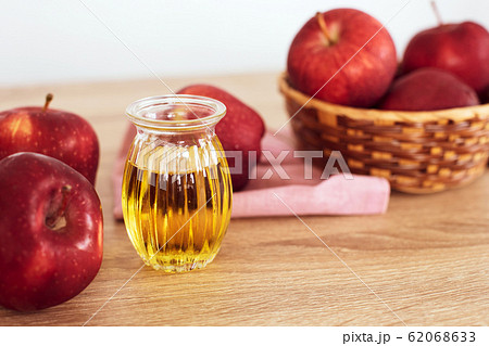 Close up red Apple fruit  and apple cider vinegar 62068633