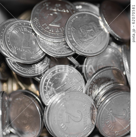 metal coins, one and two hryvnia nominee, closeup. metal coins, one and two hryvnia nominee, closeup. 62070581