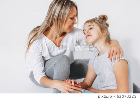 Beautiful blonde mom and daughter preteen  62073225
