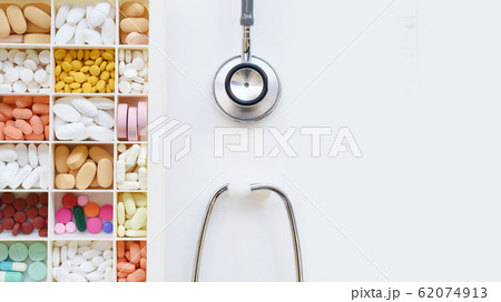 close up of different medication with stethoscope close up of different medication with stethoscope 62074913