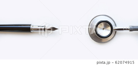 close up of stethoscope with pen 62074915