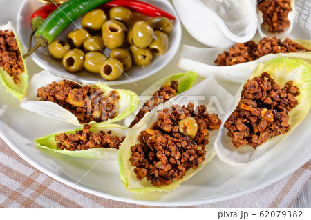 close-up of Endive Boats on a white plate 62079382