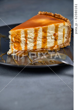 Sweet dessert from air curd cheesecake poured with 62080161