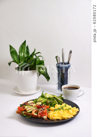 Light breakfast with fried eggs, toast with Light breakfast with fried eggs, toast with 62080172