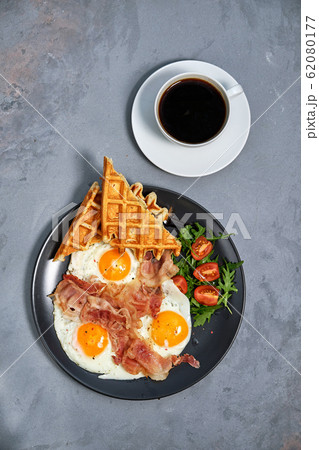 Hearty breakfast of scrambled eggs with bacon, Hearty breakfast of scrambled eggs with bacon, 62080177